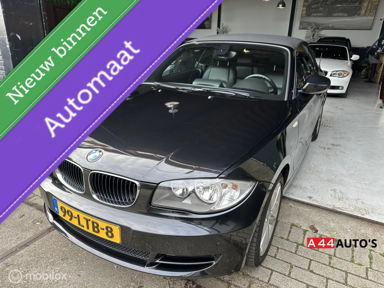 BMW 1-Serie (2010) — foto 1