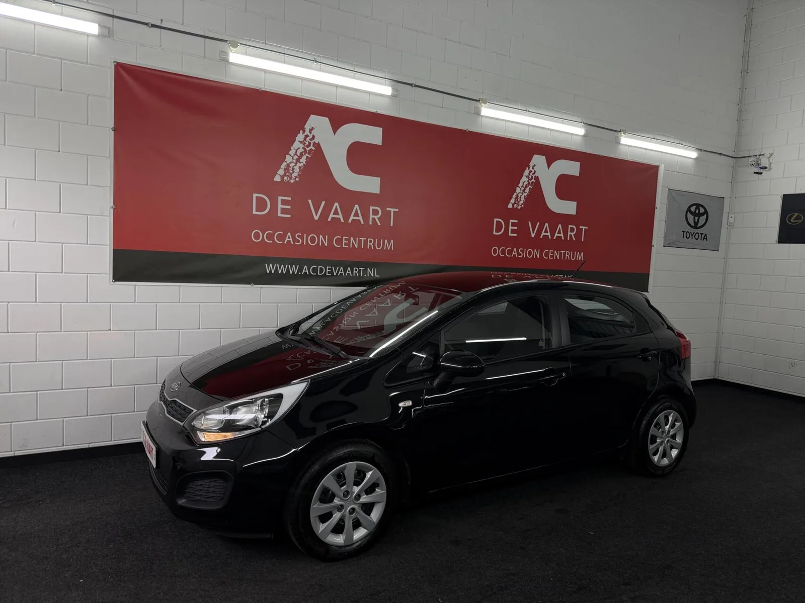 Kia Rio (2011) — foto 1