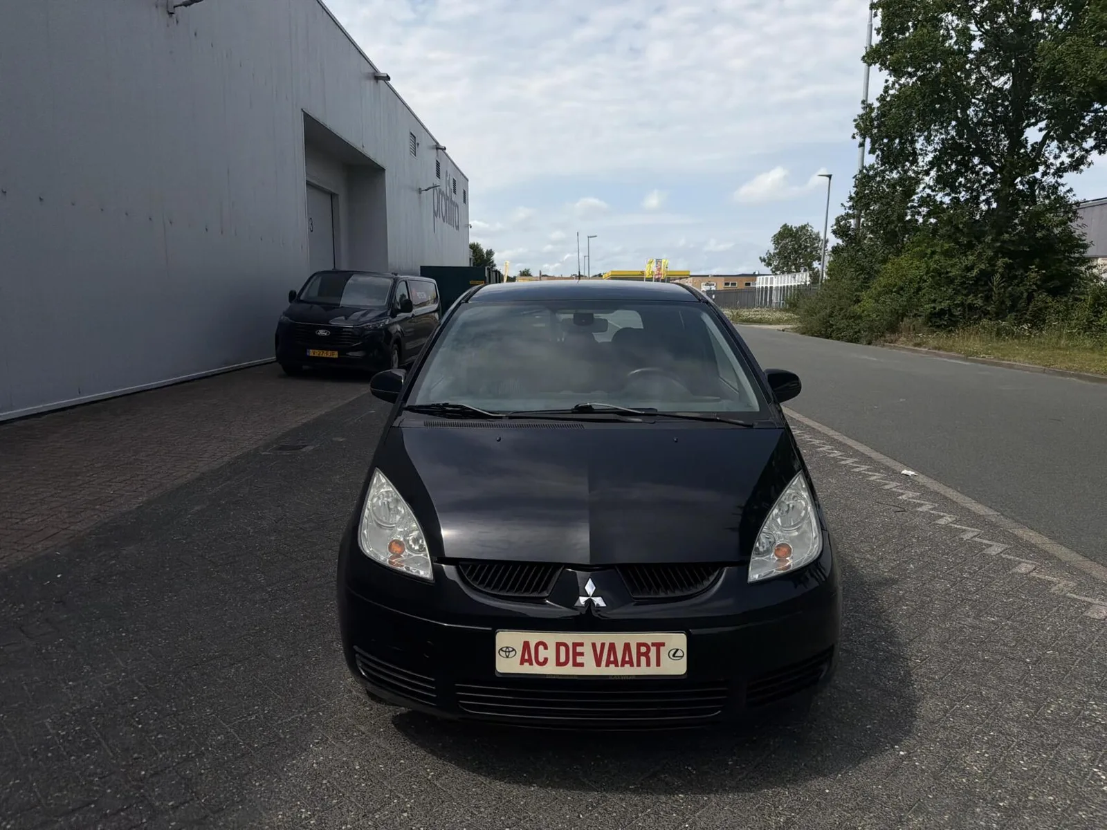 Mitsubishi Colt (2008) — foto 1