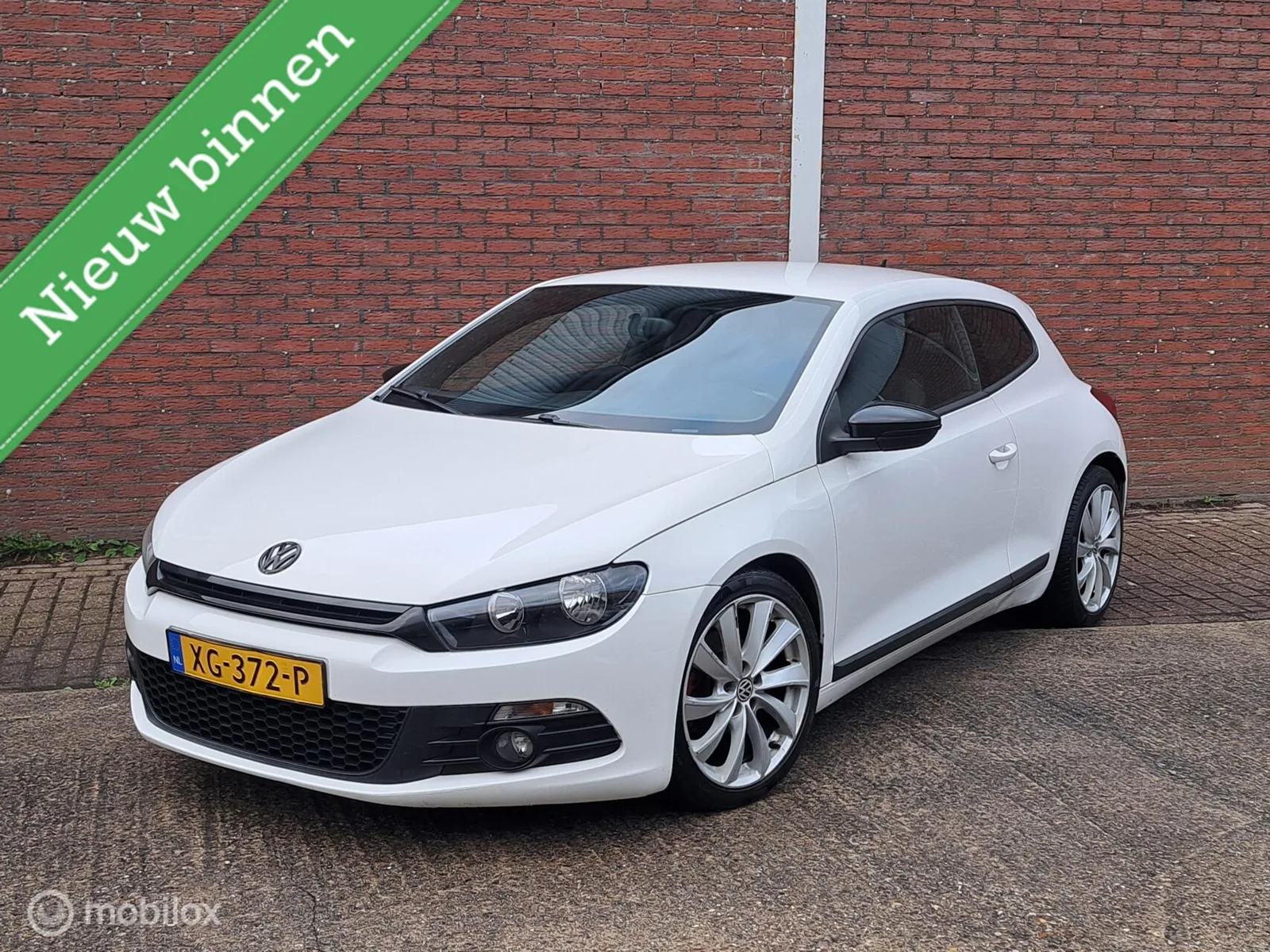 Volkswagen Scirocco (2010) — foto 1