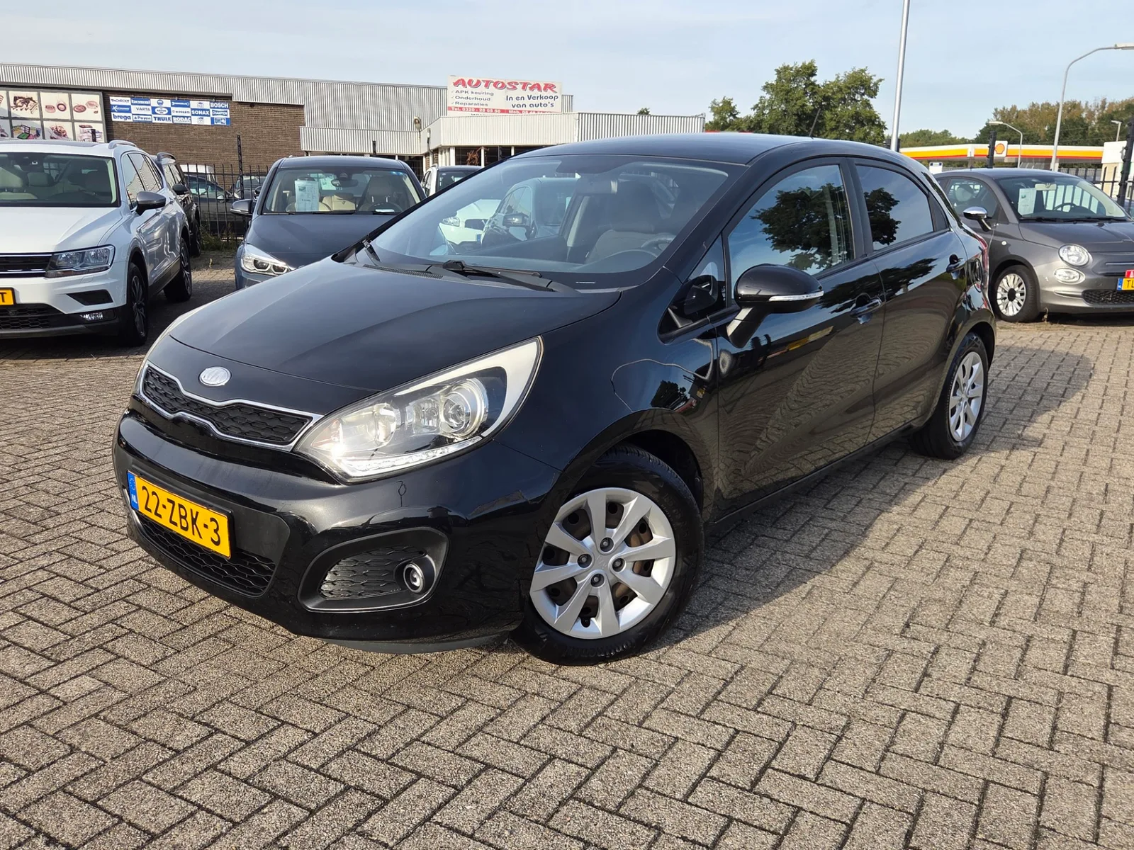 Kia Rio (2013) — foto 1