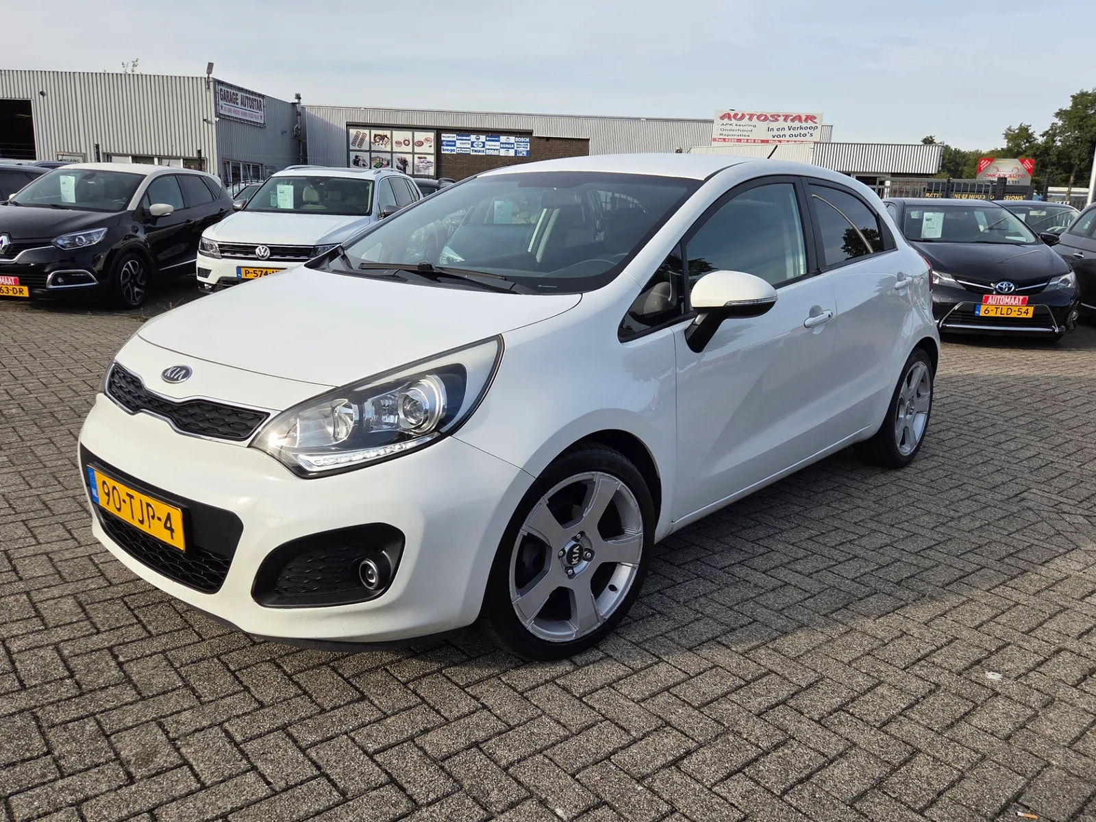 Kia Rio (2012) — foto 1