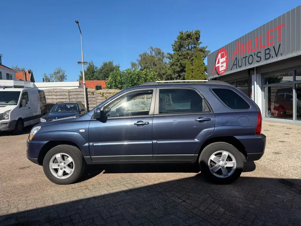 Kia Sportage (2009) — foto 1