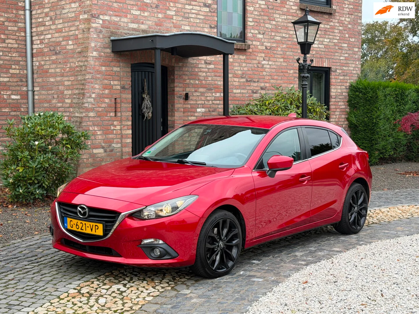 Mazda 3 (2013) — foto 1