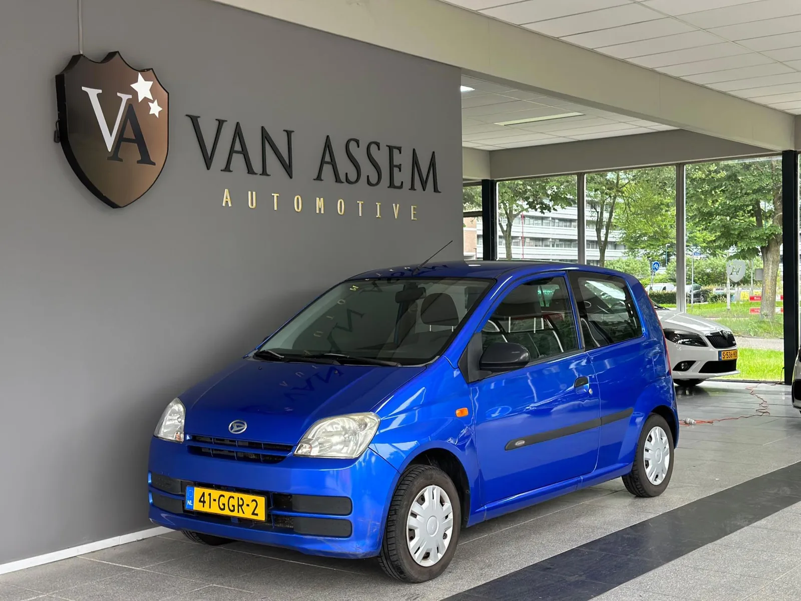 Daihatsu Cuore (2008) — foto 1