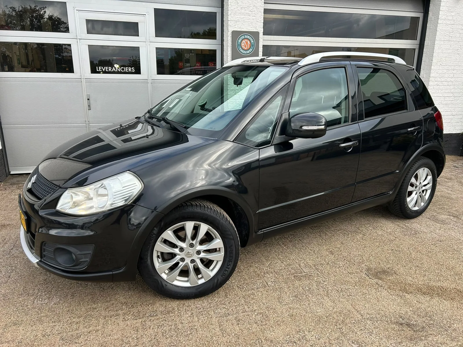 Suzuki SX4 (2013) — foto 1