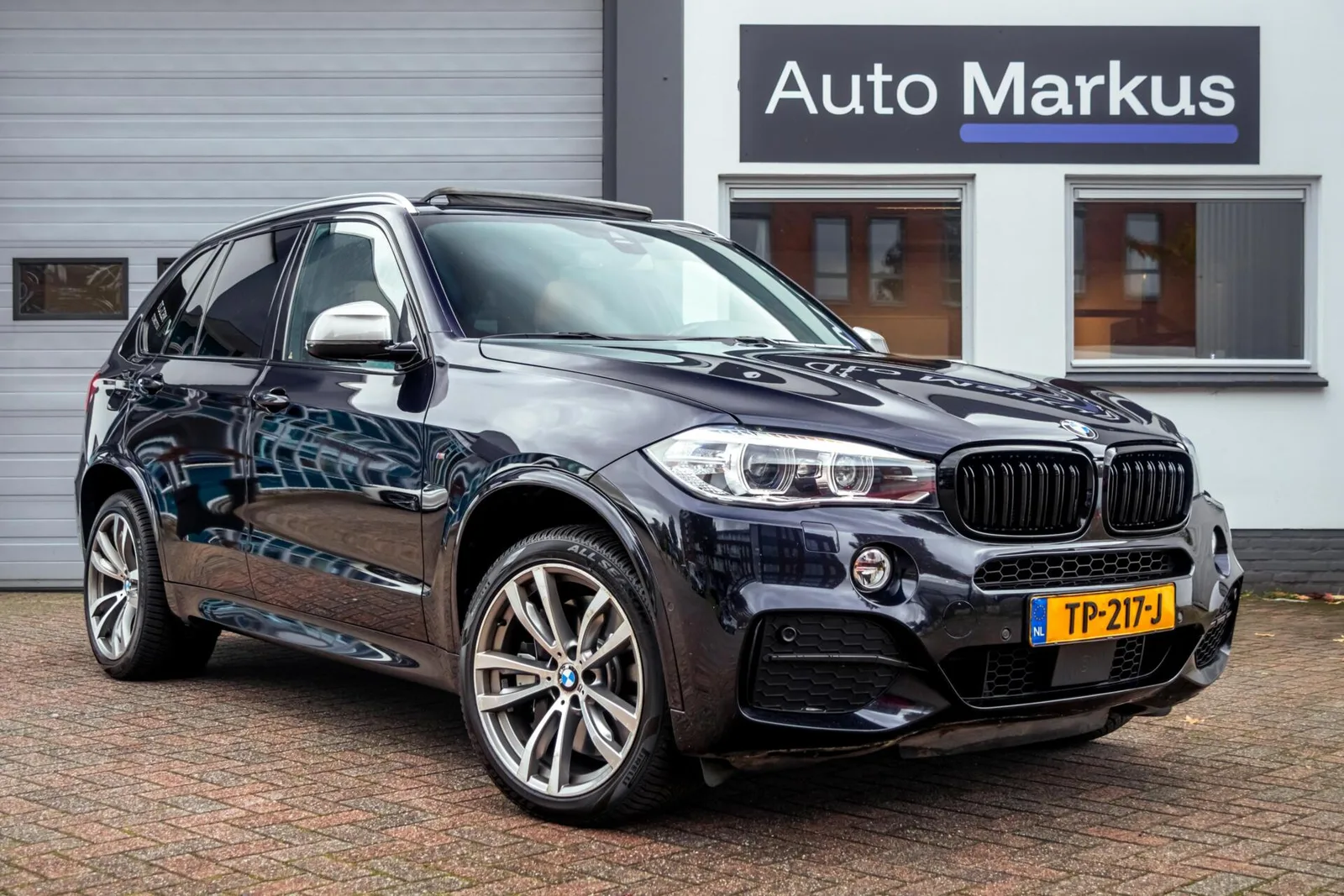 BMW X5 (2014) — foto 1