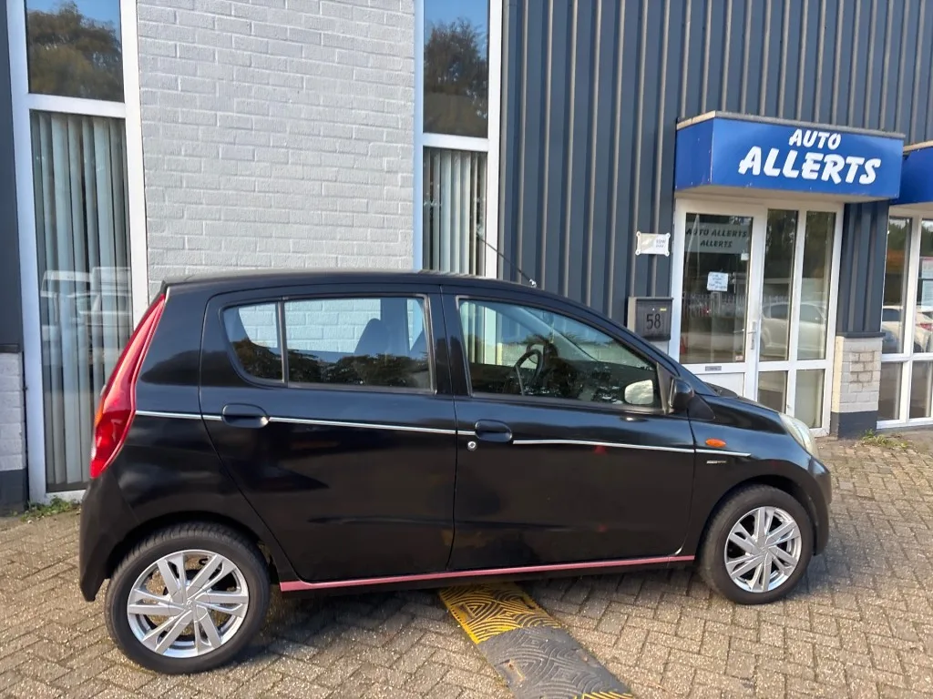Daihatsu Cuore (2008) — foto 1
