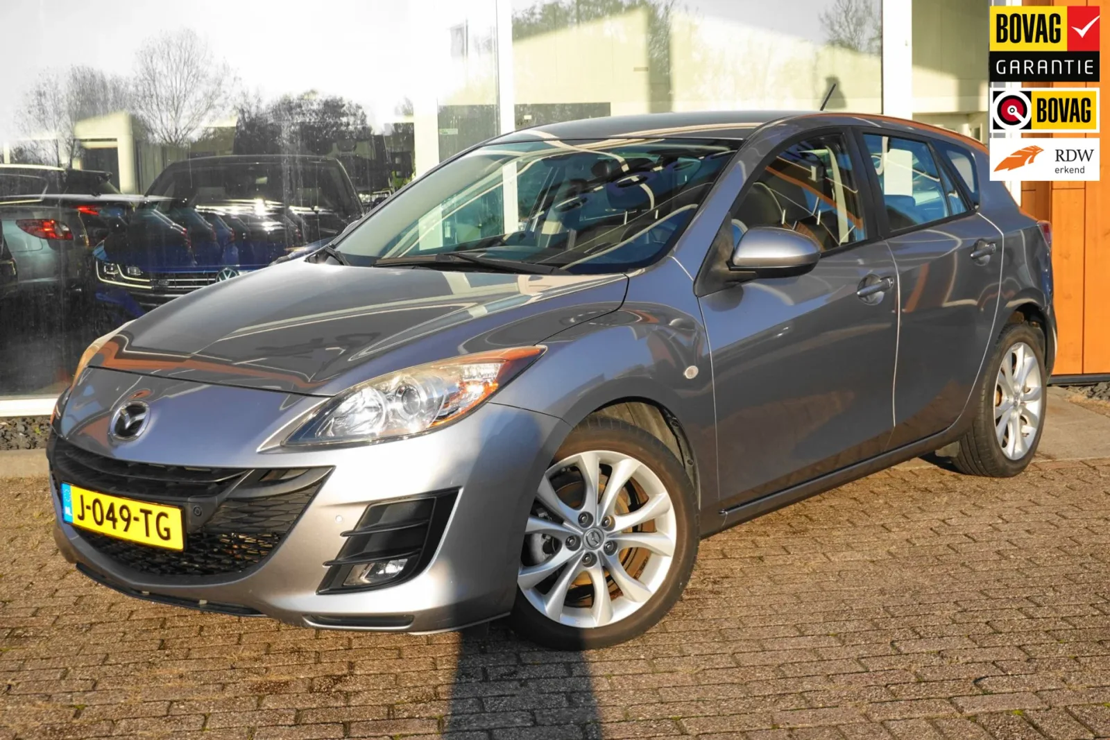 Mazda 3 (2009) — foto 1