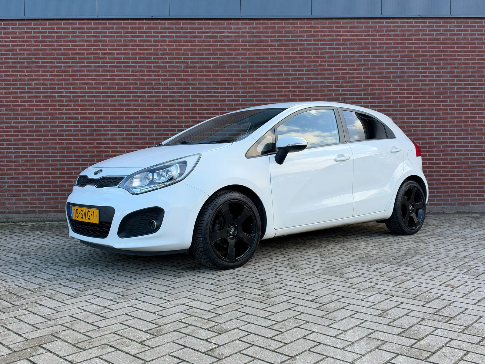 Kia Rio (2011) — foto 1