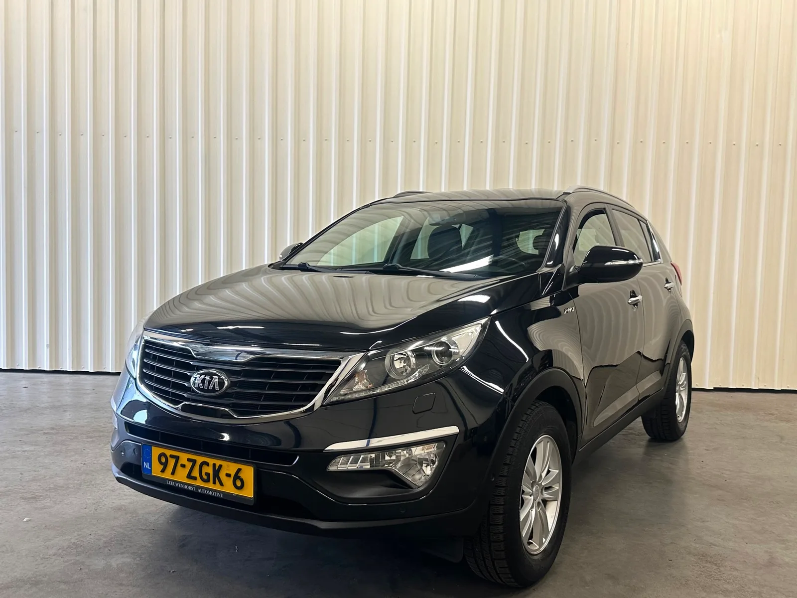 Kia Sportage (2012) — foto 1