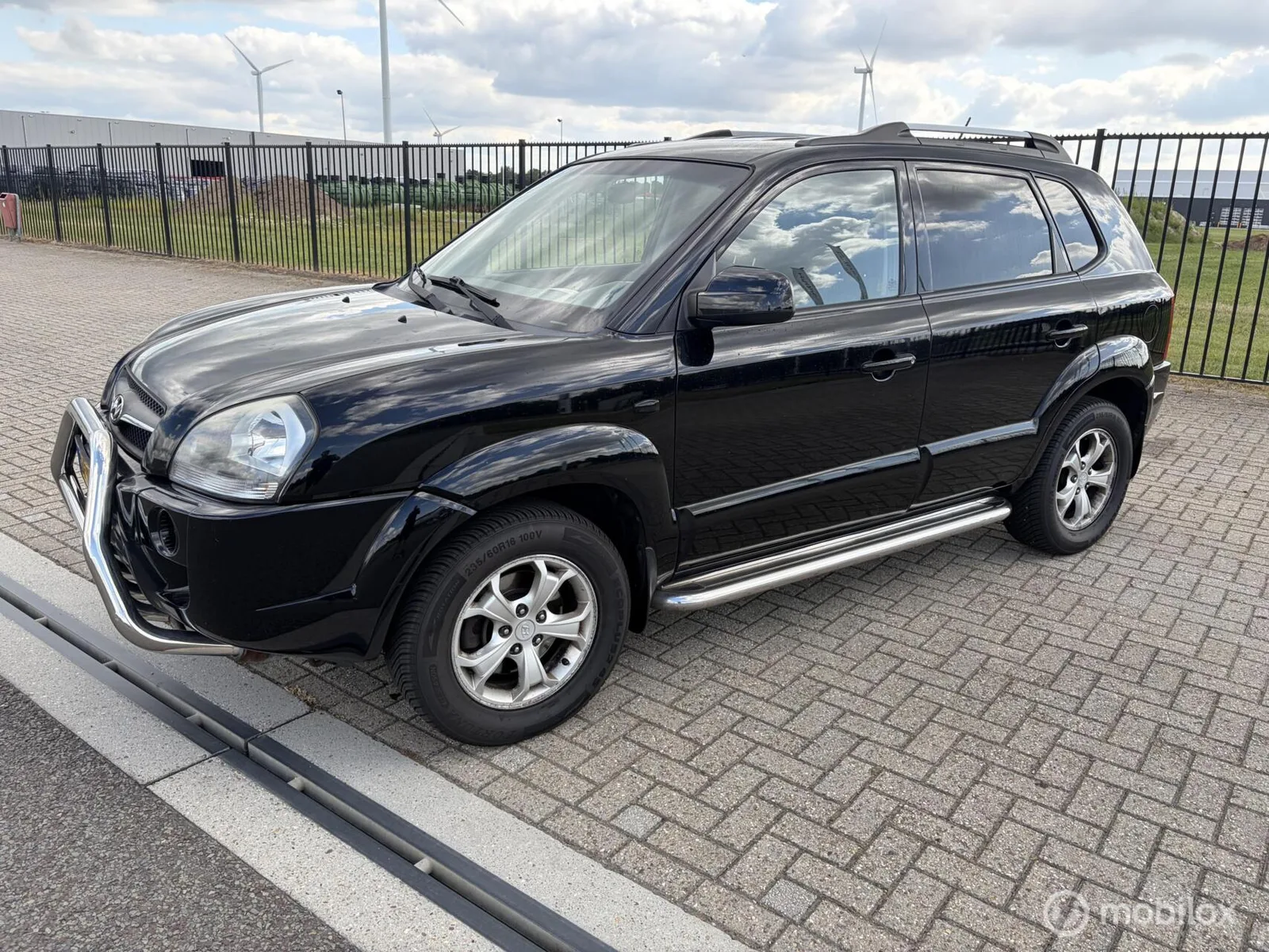 Hyundai Tucson (2009) — foto 1