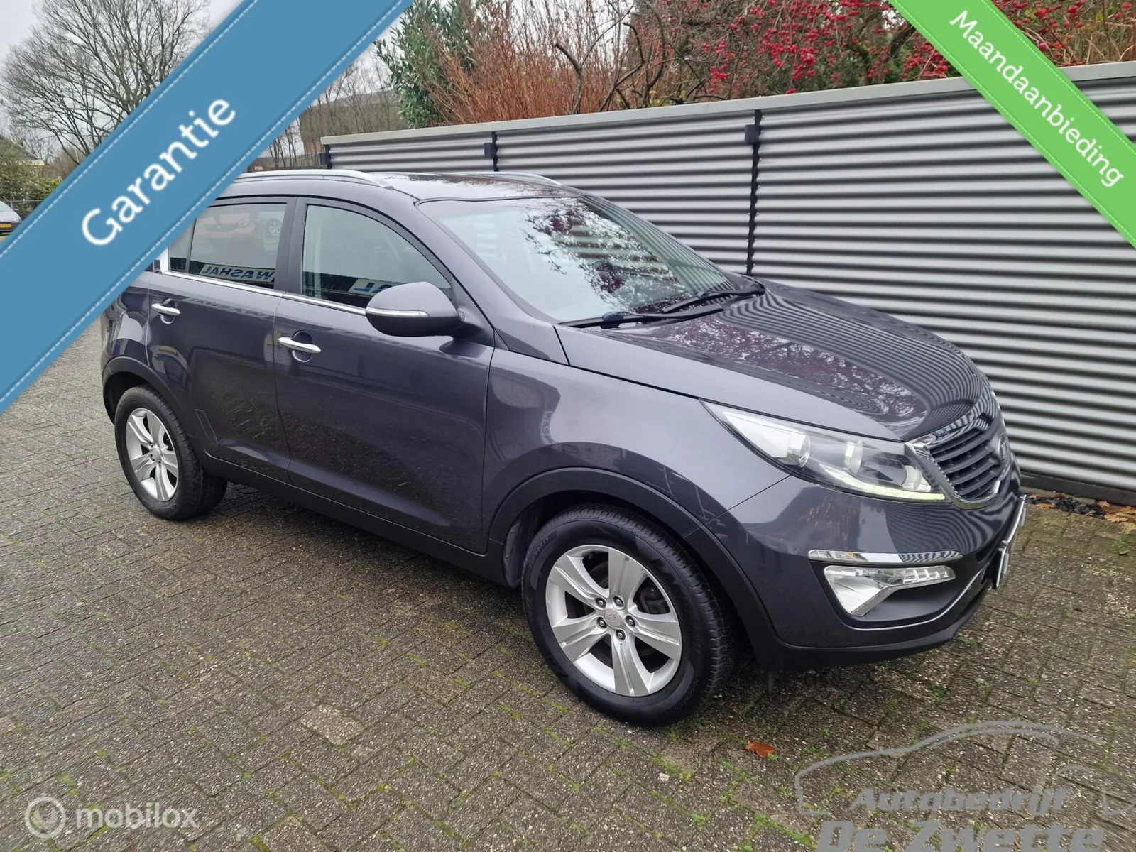 Kia Sportage (2013) — foto 1