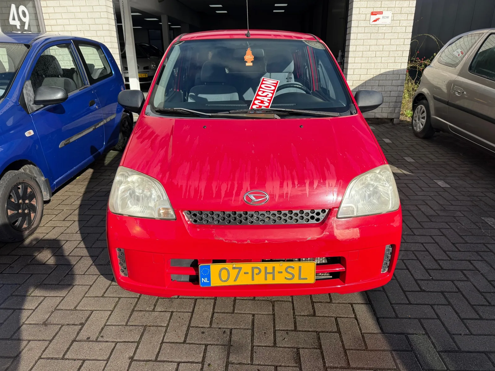 Daihatsu Cuore (2004) — foto 1