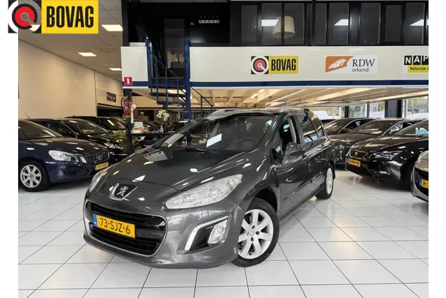 Peugeot 308 (2011) — foto 1