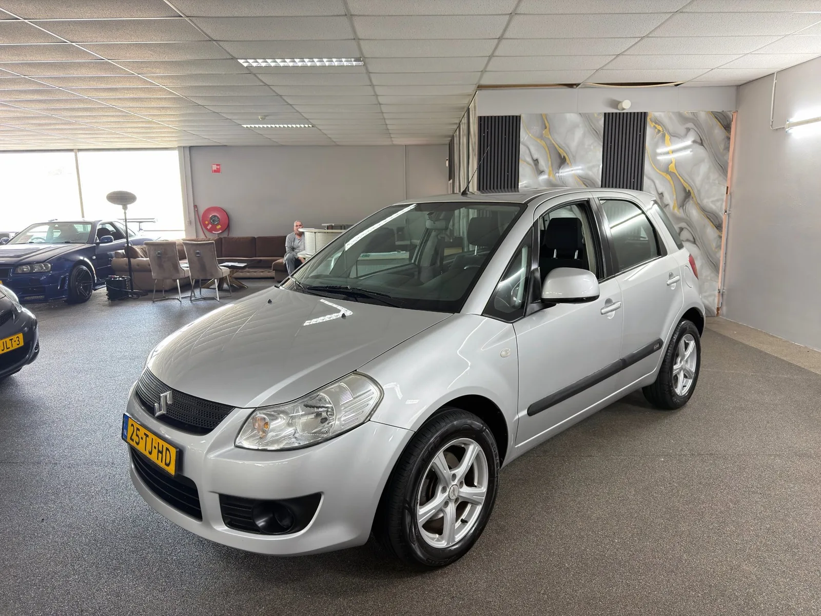 Suzuki SX4 (2006) — foto 1