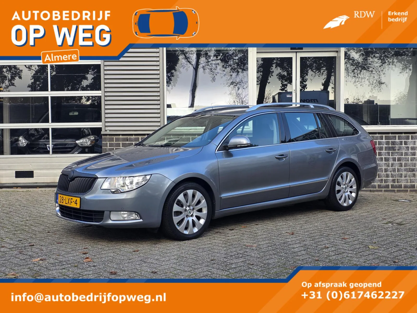 Škoda Superb (2010) — foto 1