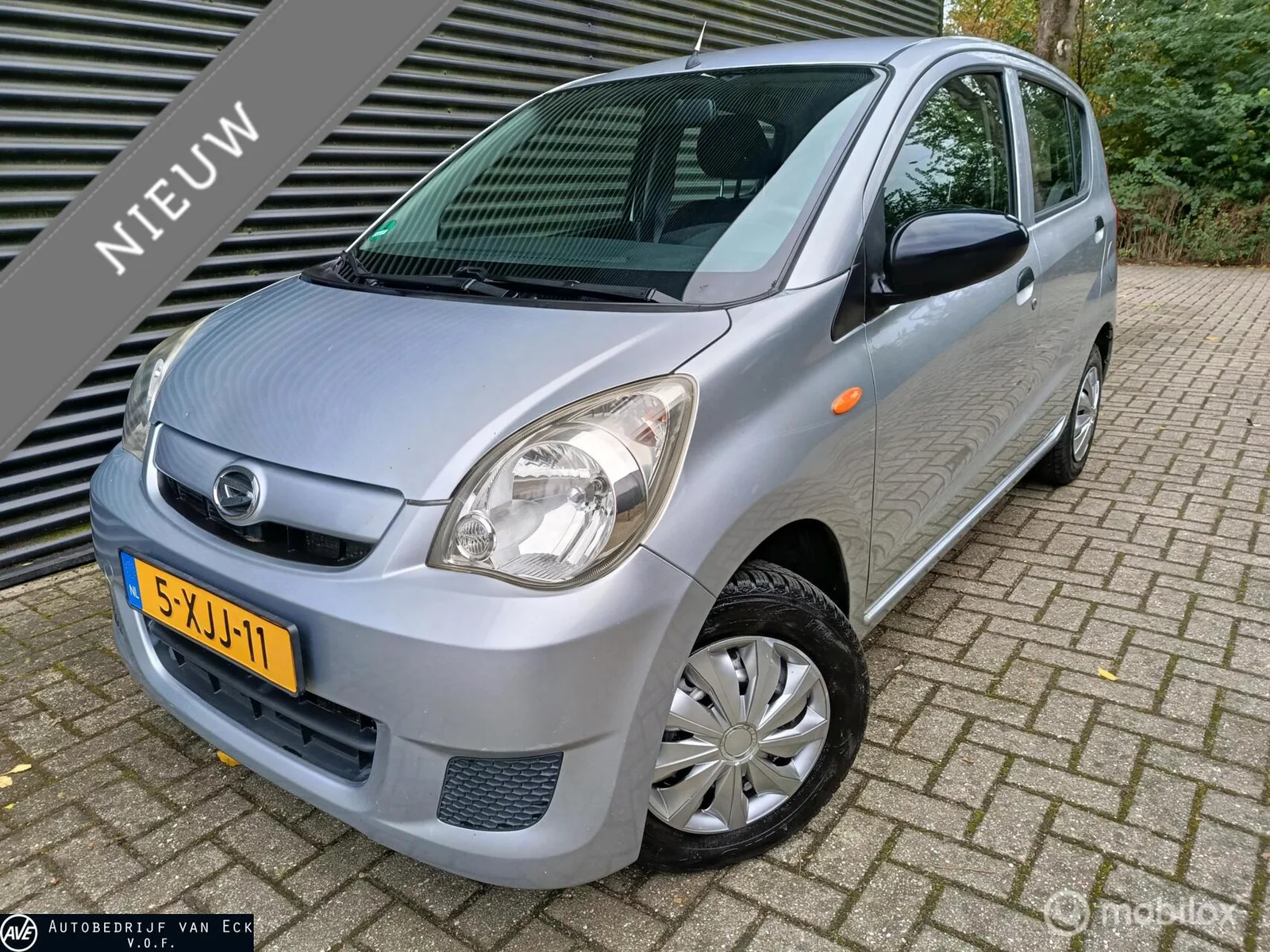 Daihatsu Cuore (2010) — foto 1
