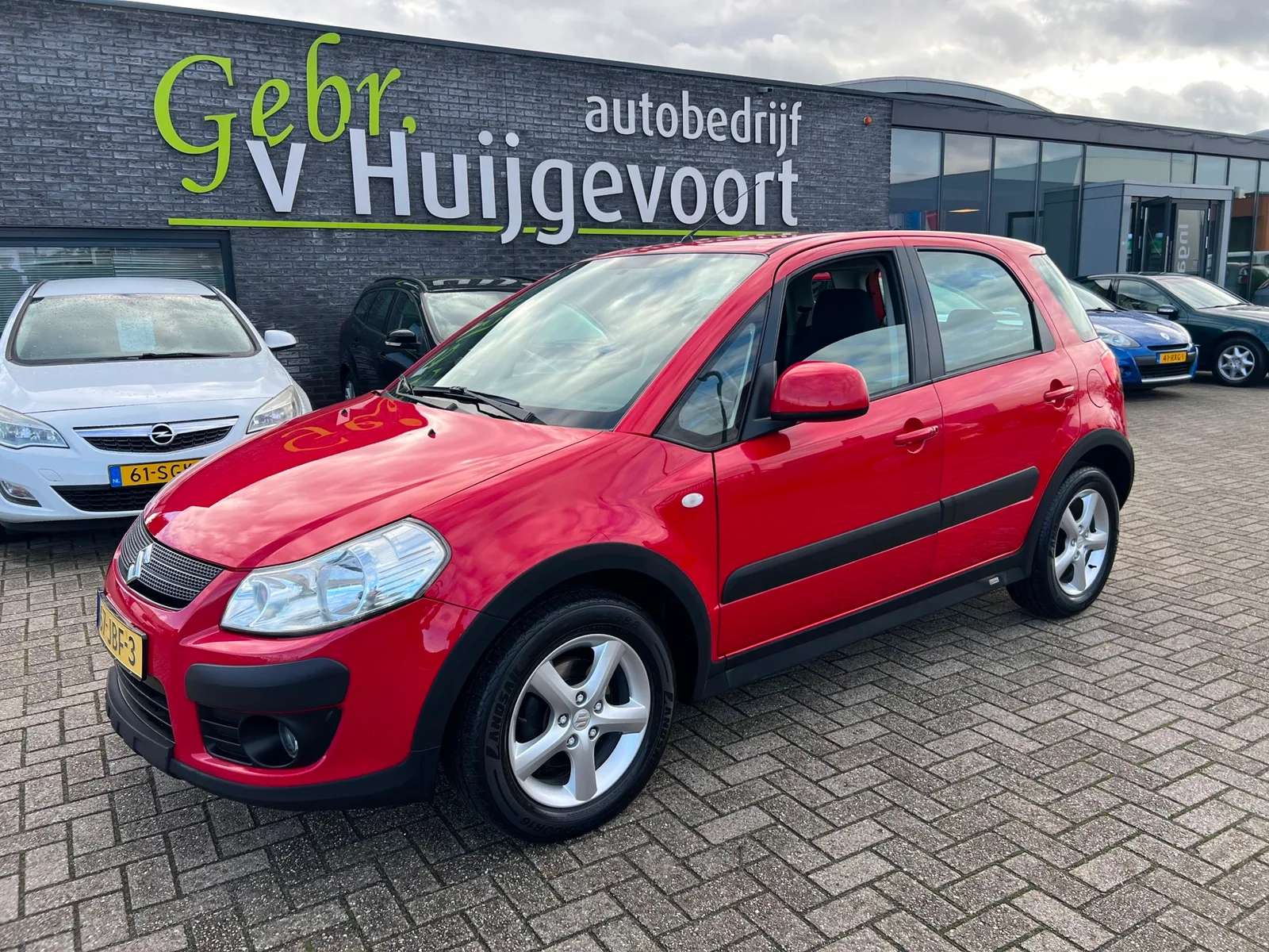 Suzuki SX4 (2009) — foto 1