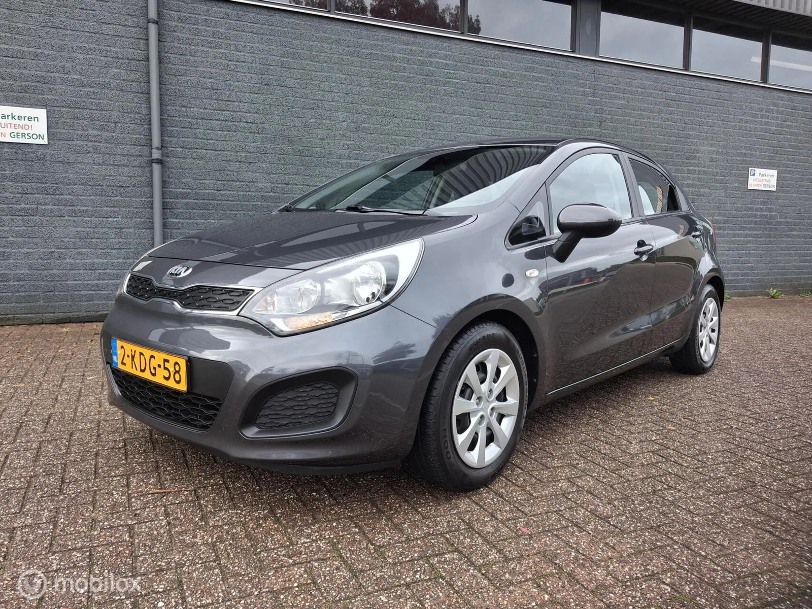 Kia Rio (2013) — foto 1
