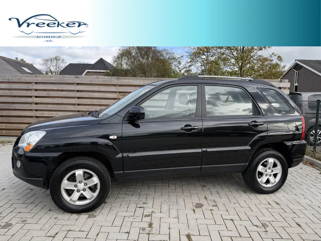 Kia Sportage (2009) — foto 1