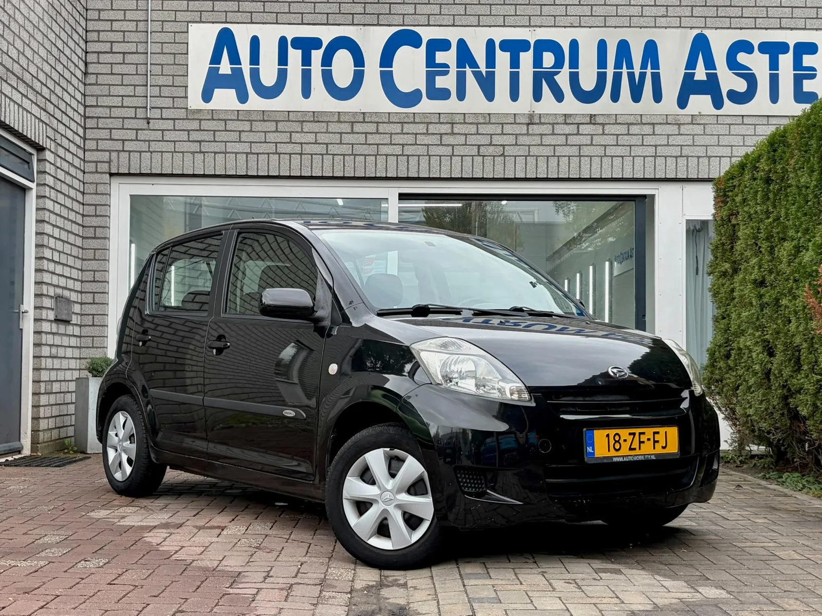 Daihatsu Sirion (2008) — foto 1
