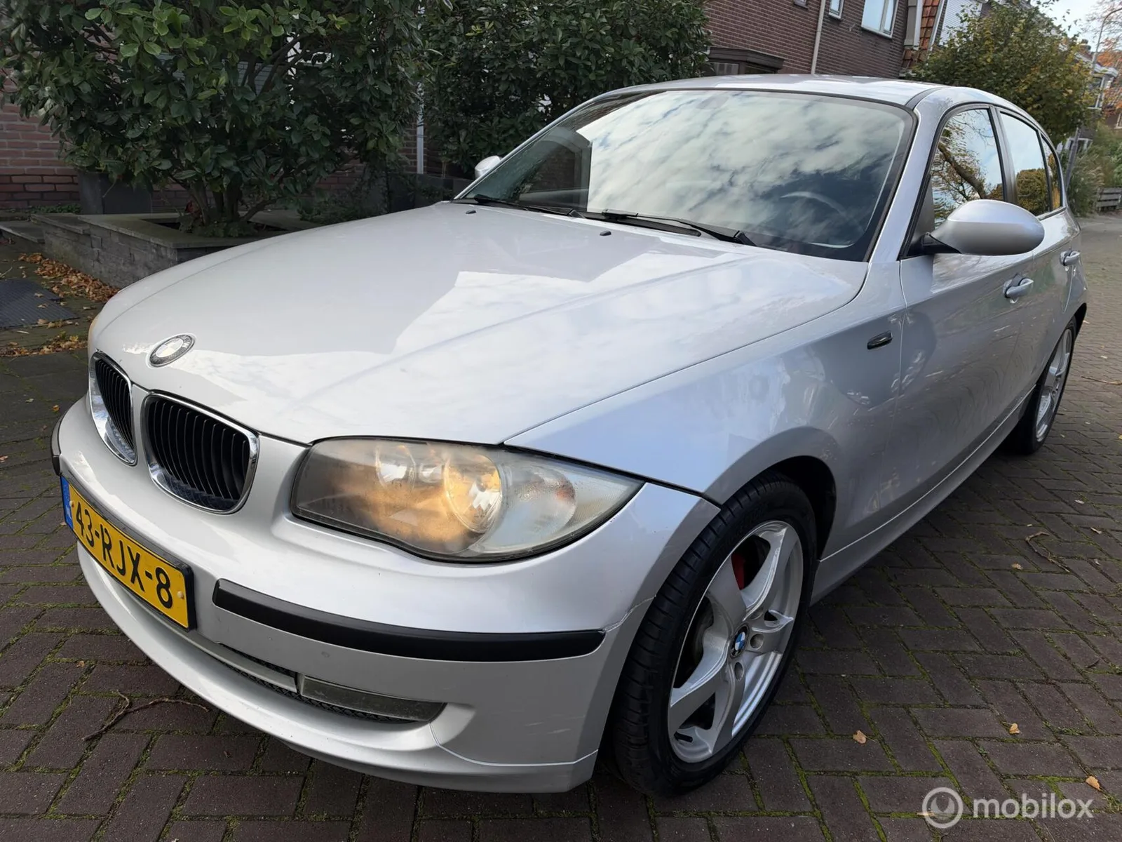 BMW 1-Serie (2007) — foto 1