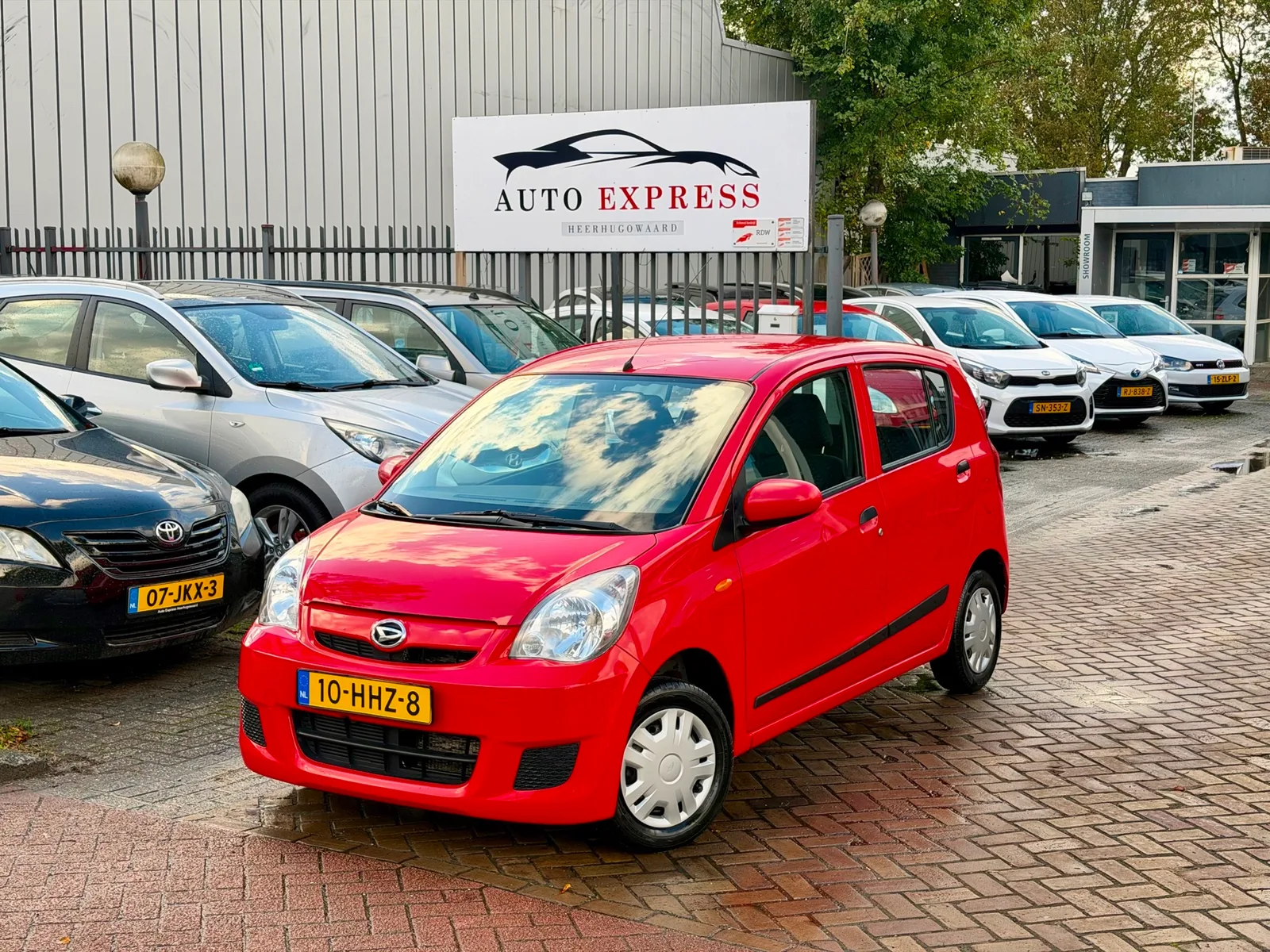 Daihatsu Cuore (2008) — foto 1