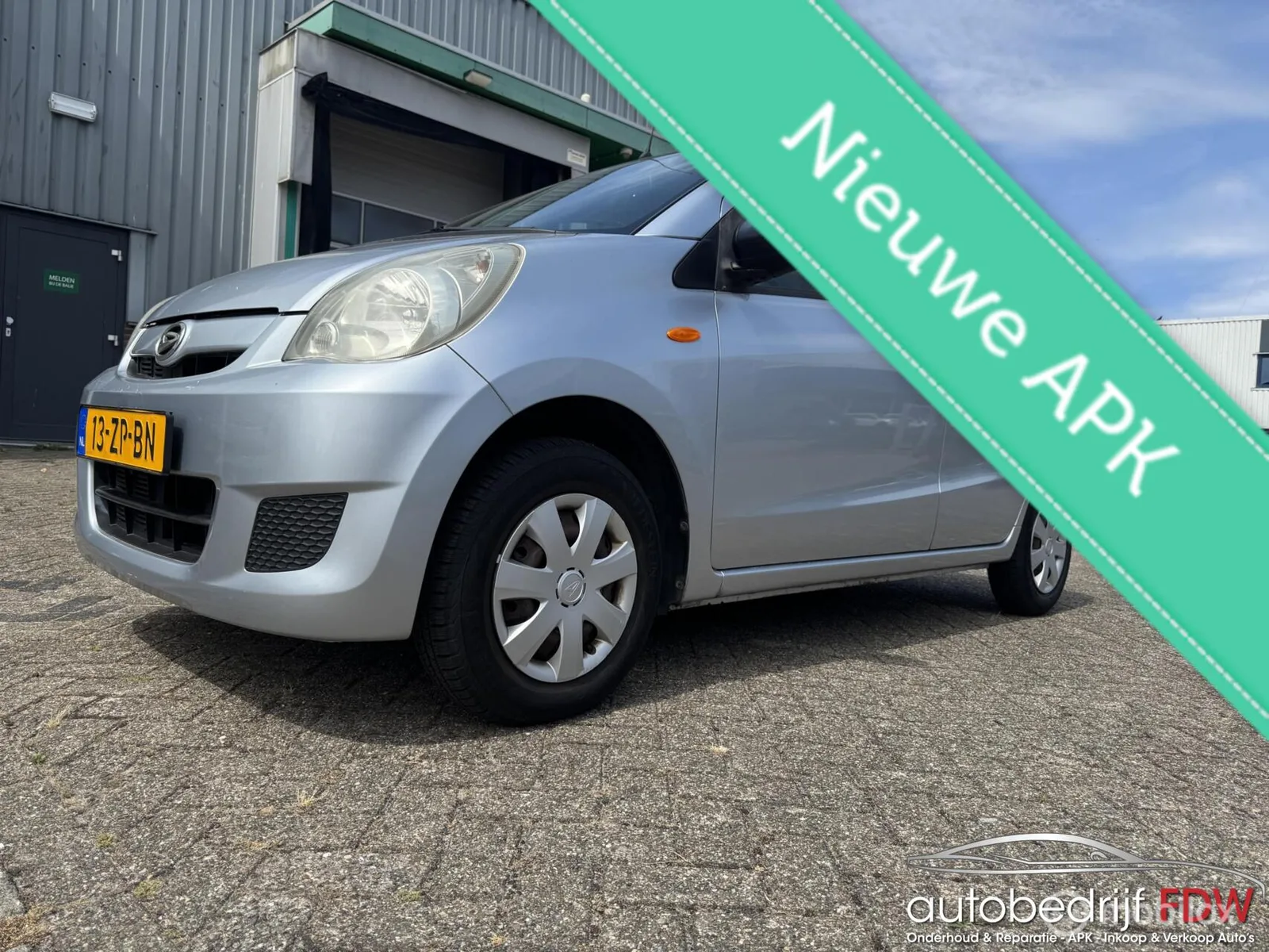 Daihatsu Cuore (2008) — foto 1