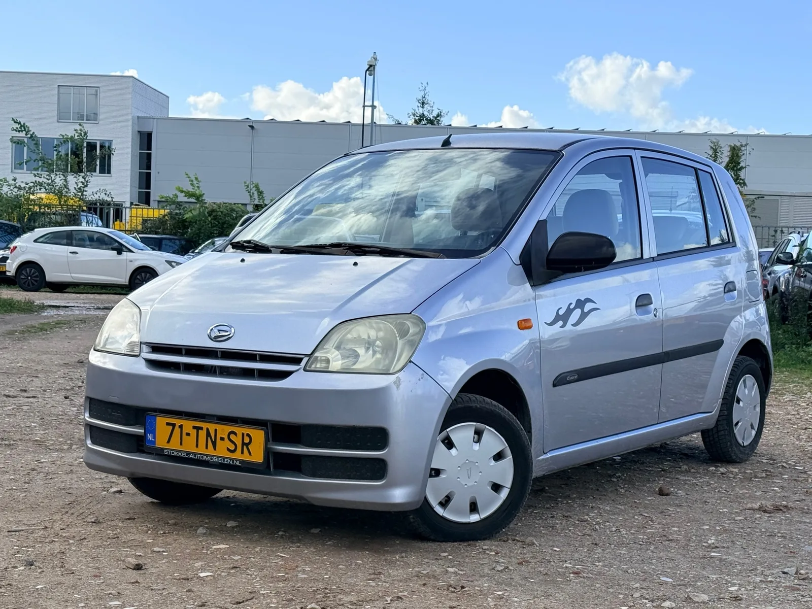 Daihatsu Cuore (2006) — foto 1