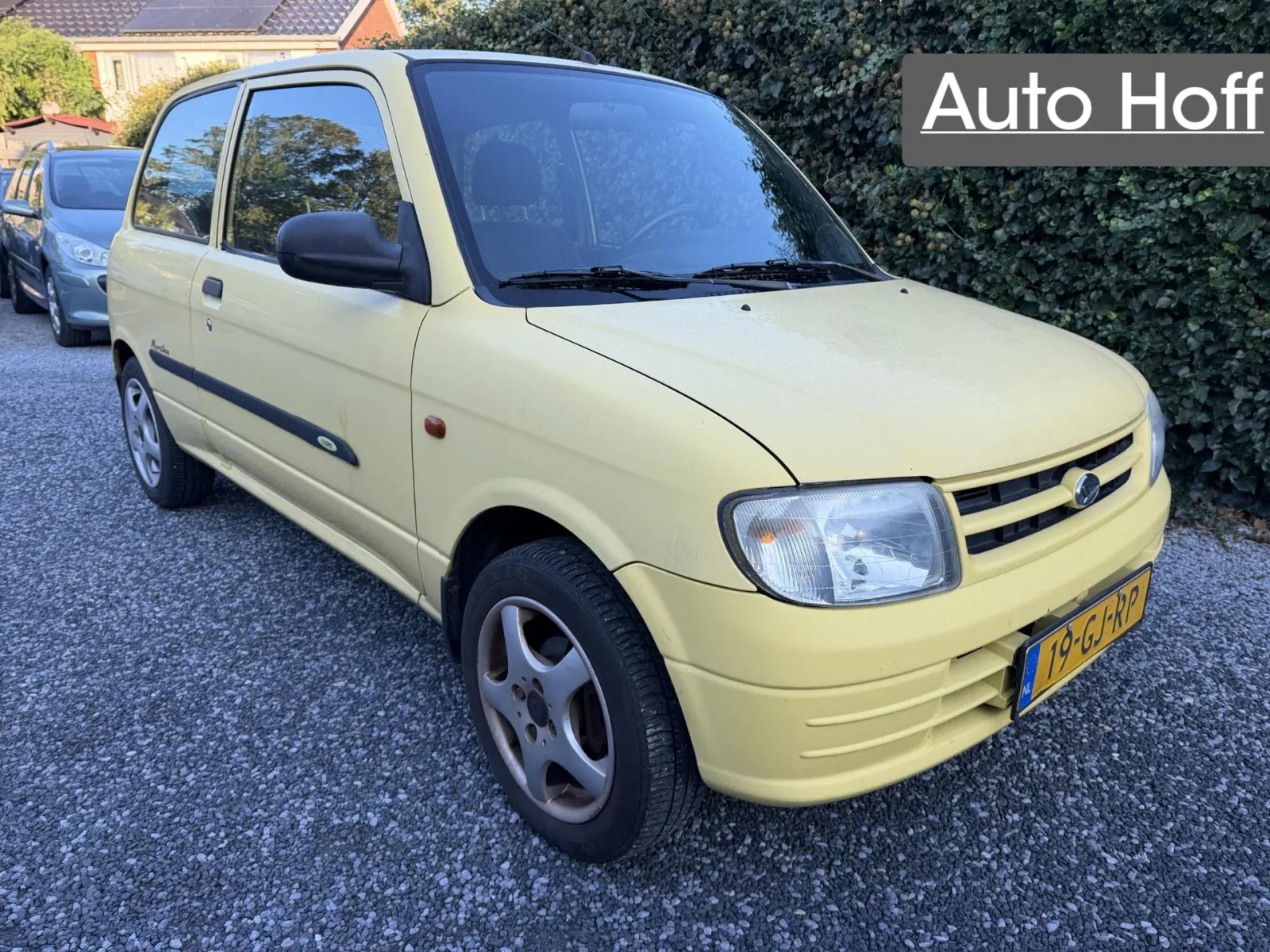 Daihatsu Cuore (2000) — foto 1