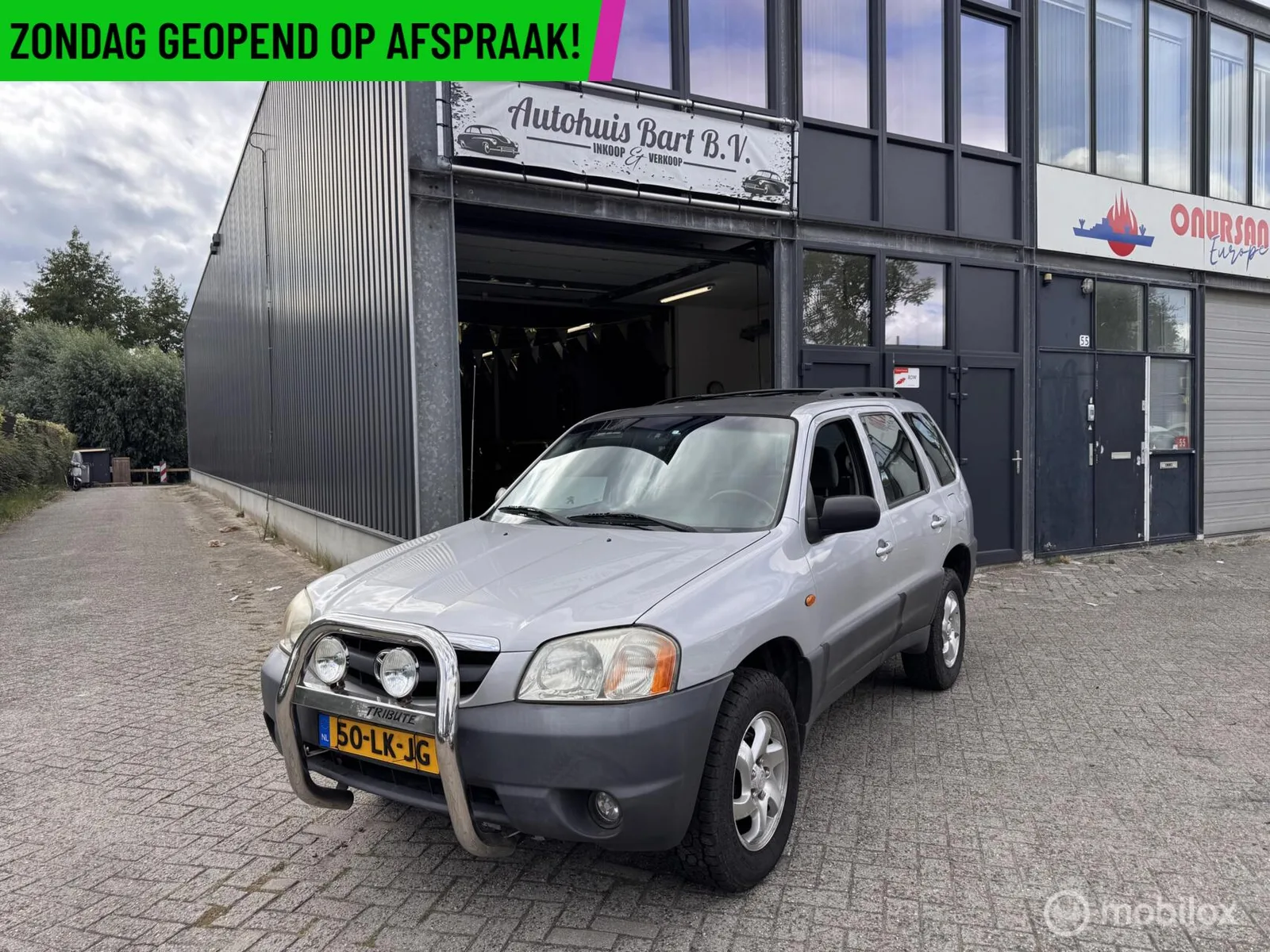Mazda Tribute (2003) — foto 1