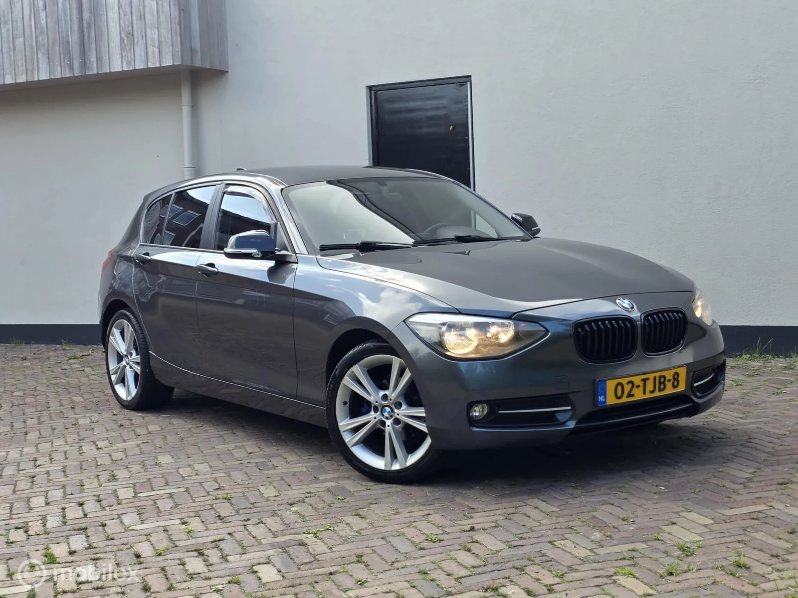 BMW 1-Serie (2012) — foto 1
