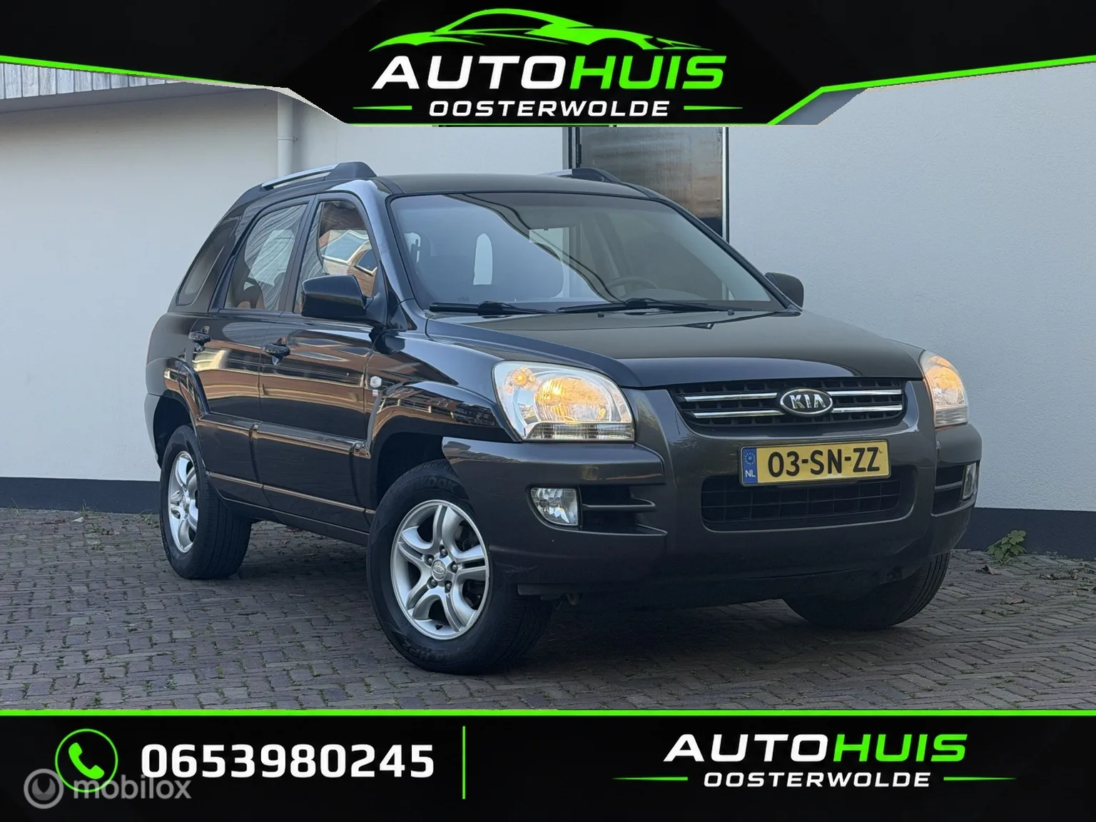 Kia Sportage (2006) — foto 1