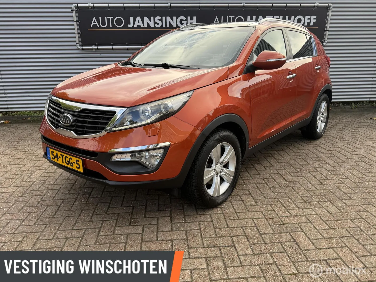 Kia Sportage (2012) — foto 1