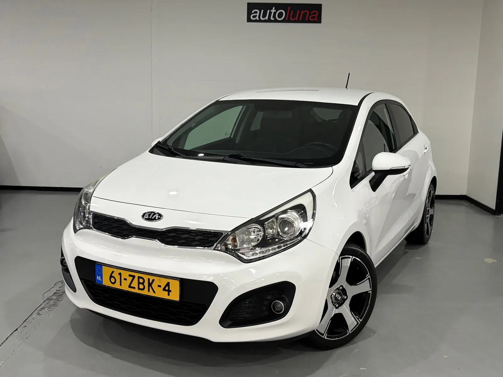 Kia Rio (2012) — foto 1