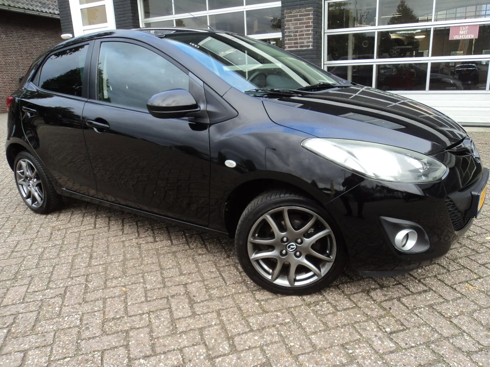 Mazda 2 (2013) — foto 1