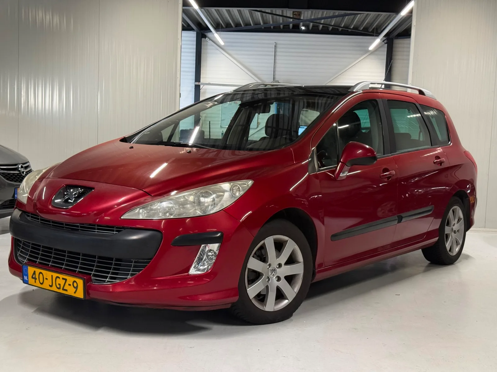 Peugeot 308 (2009) — foto 1