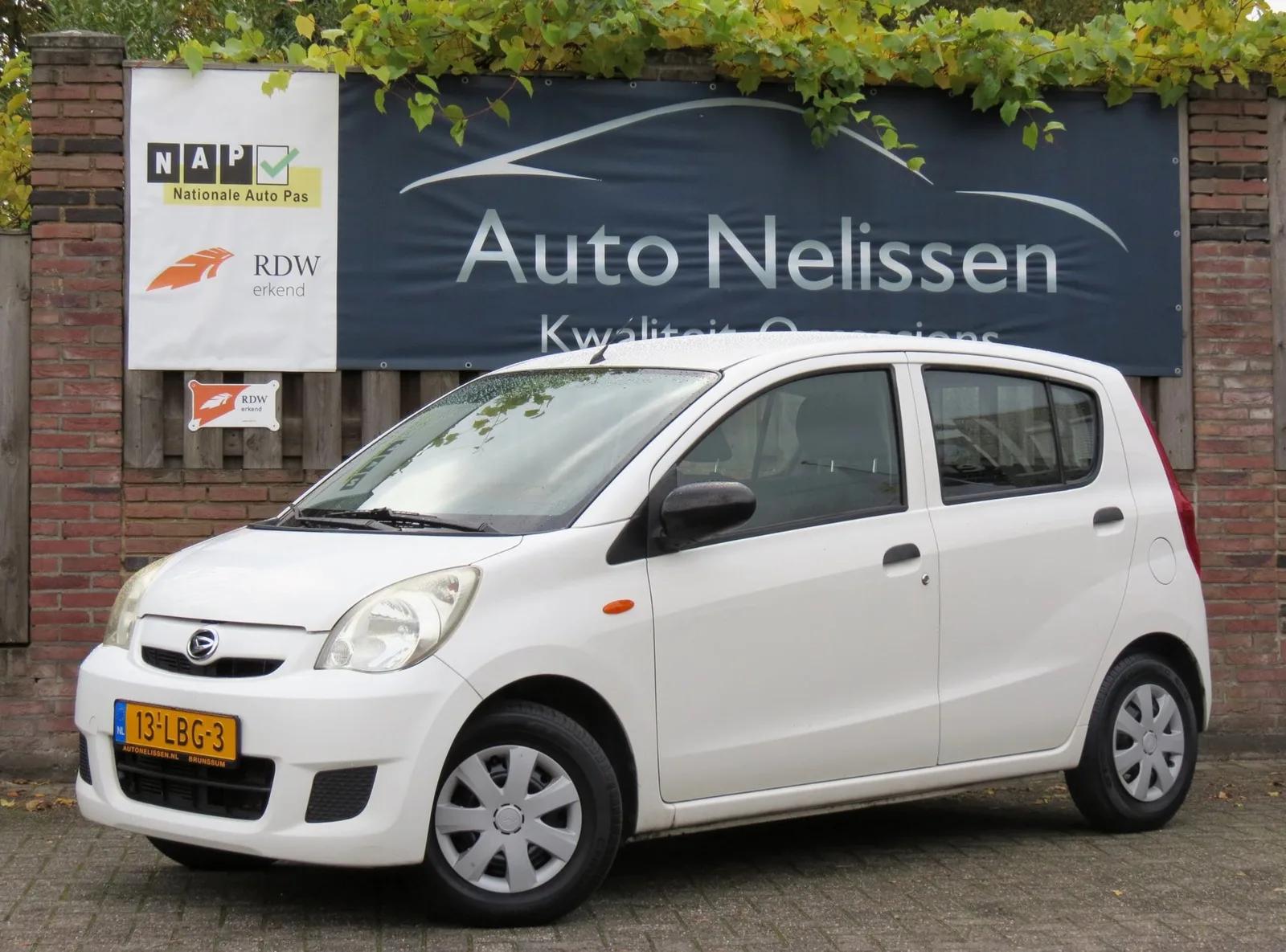 Daihatsu Cuore (2010) — foto 1