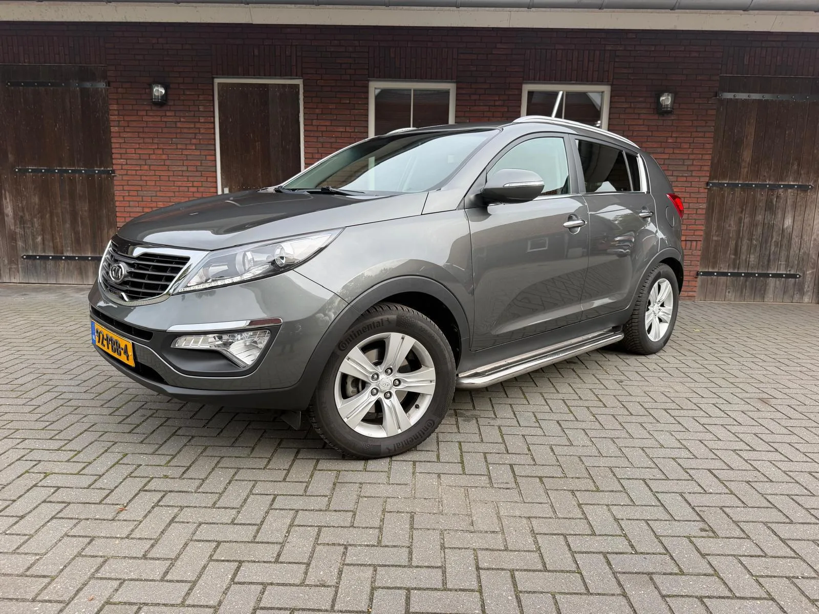 Kia Sportage (2011) — foto 1