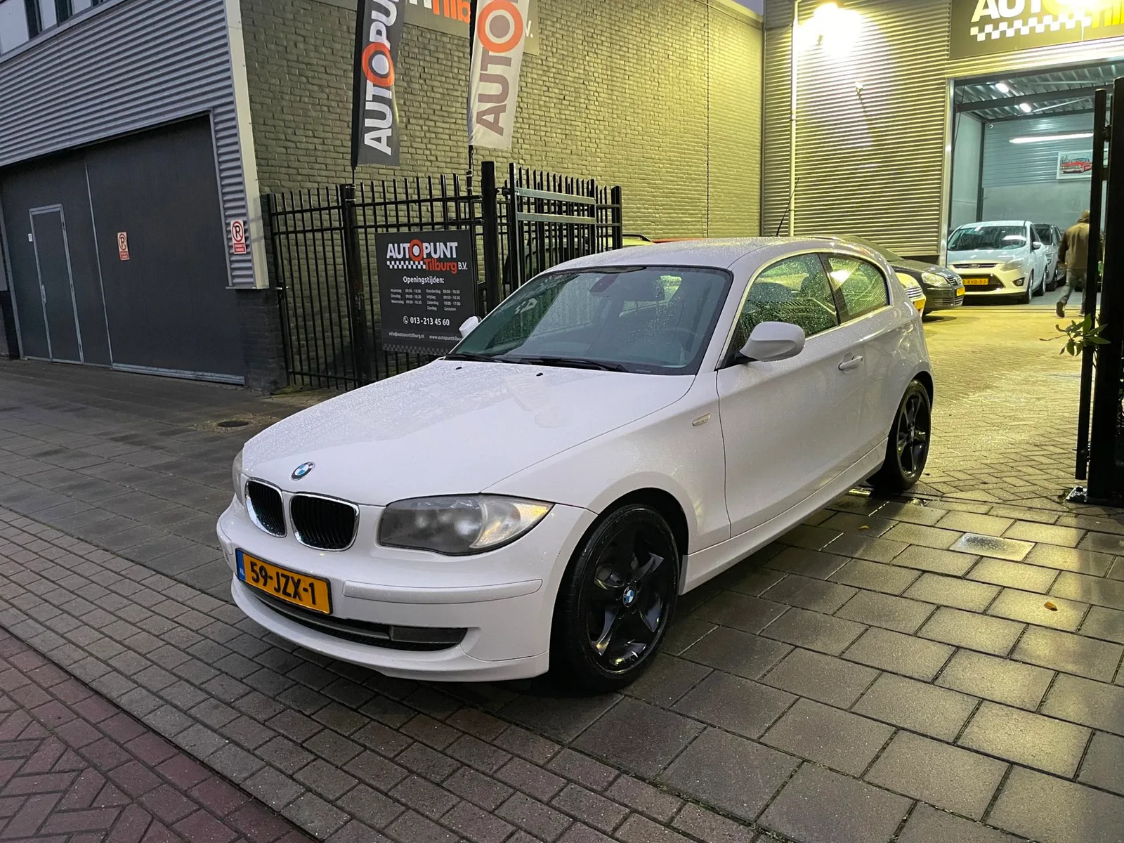 BMW 1-Serie (2009) — foto 1