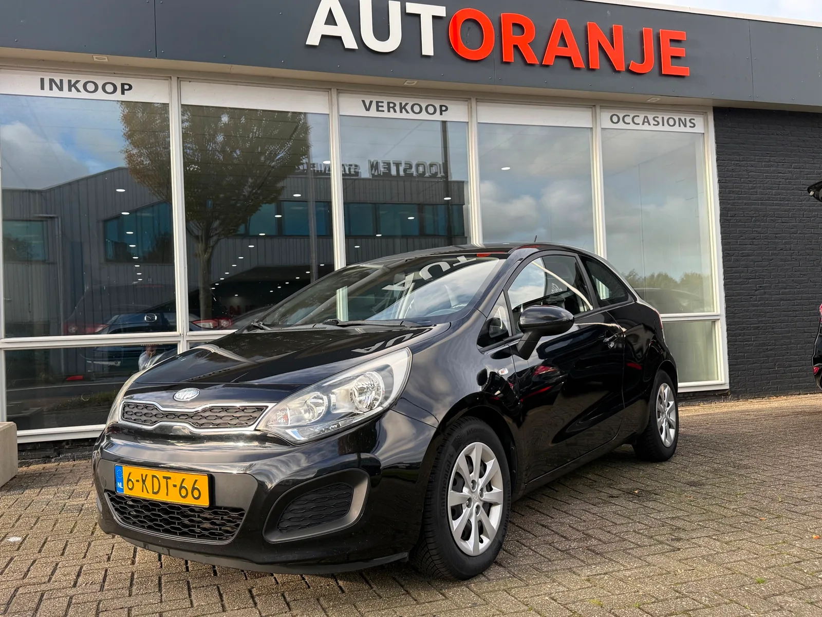 Kia Rio (2013) — foto 1