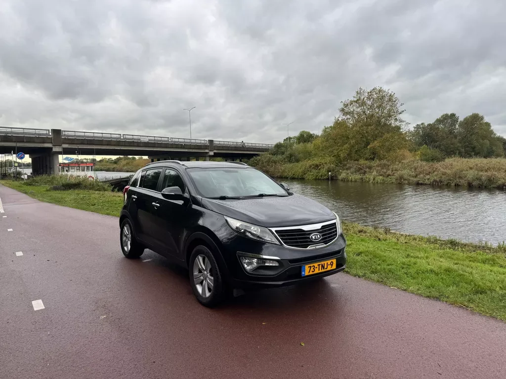 Kia Sportage (2012) — foto 1
