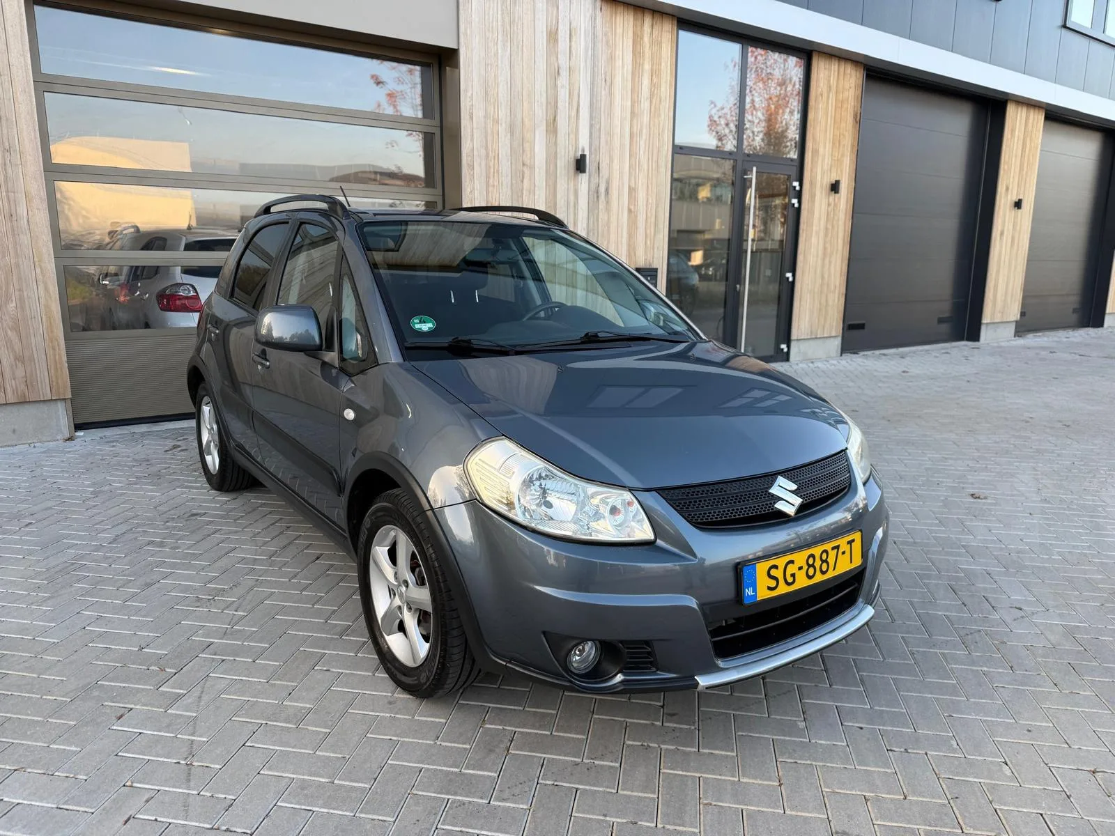 Suzuki SX4 (2008) — foto 1