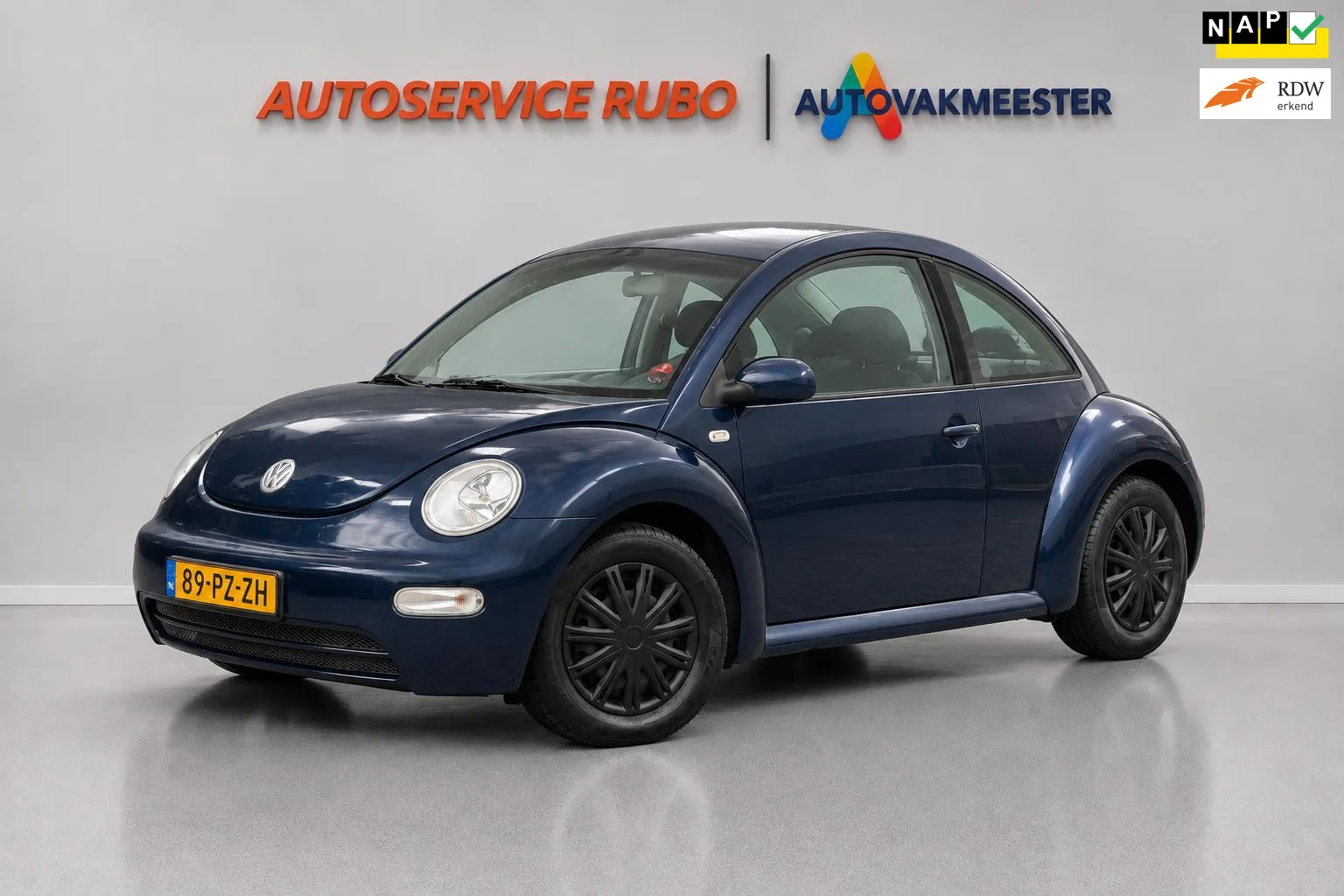 Volkswagen New Beetle (2005) — foto 1