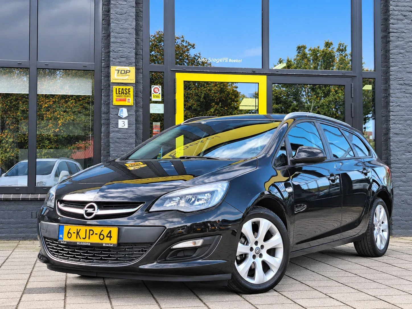 Opel Astra (2013) — foto 1