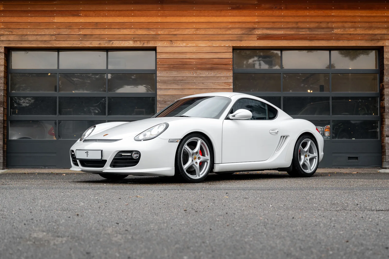 Porsche Cayman (2011) — foto 1