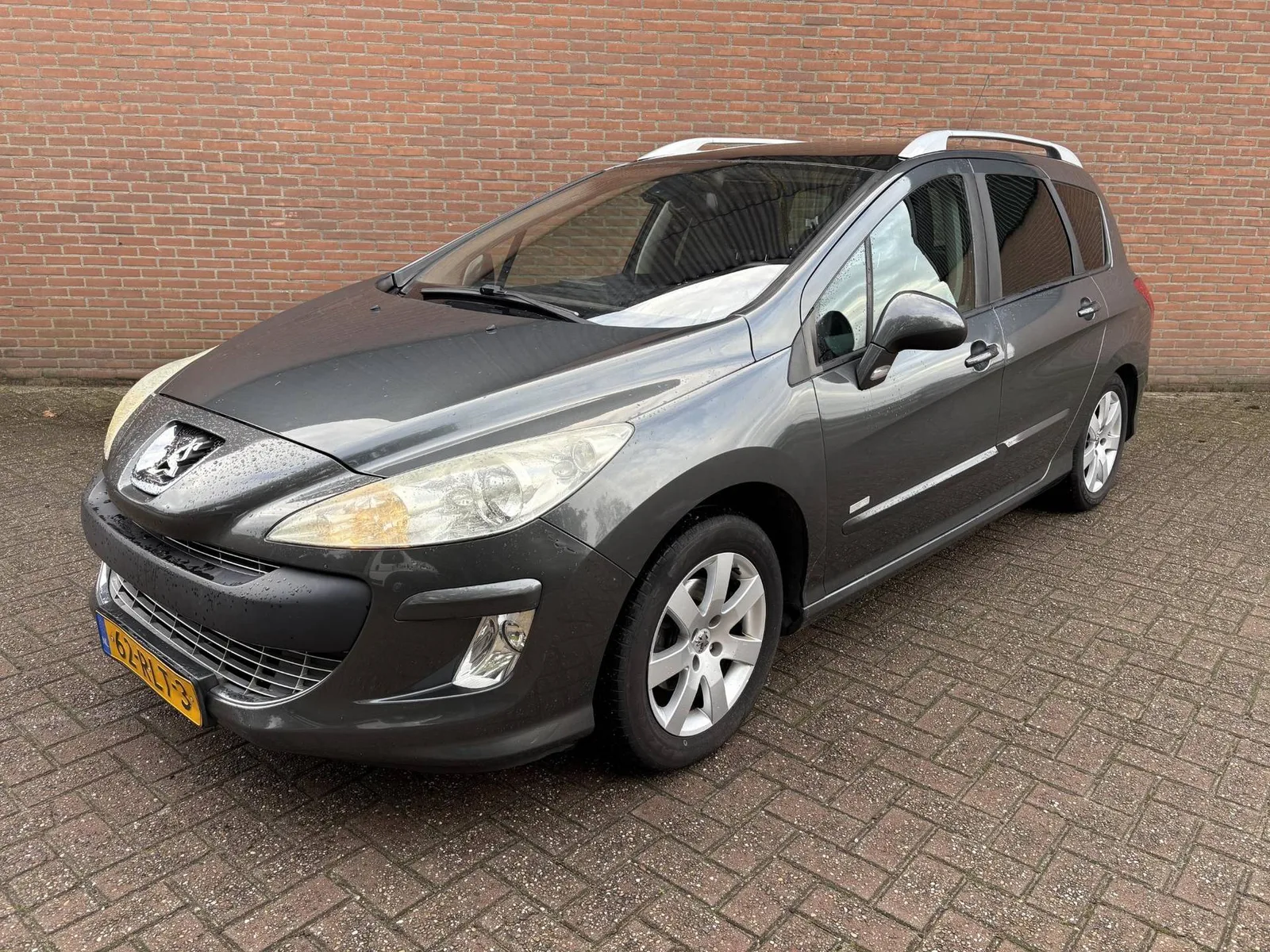 Peugeot 308 (2011) — foto 1
