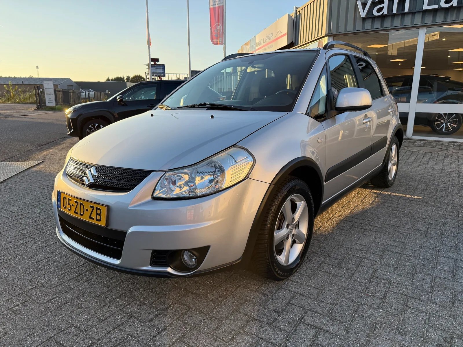 Suzuki SX4 (2008) — foto 1