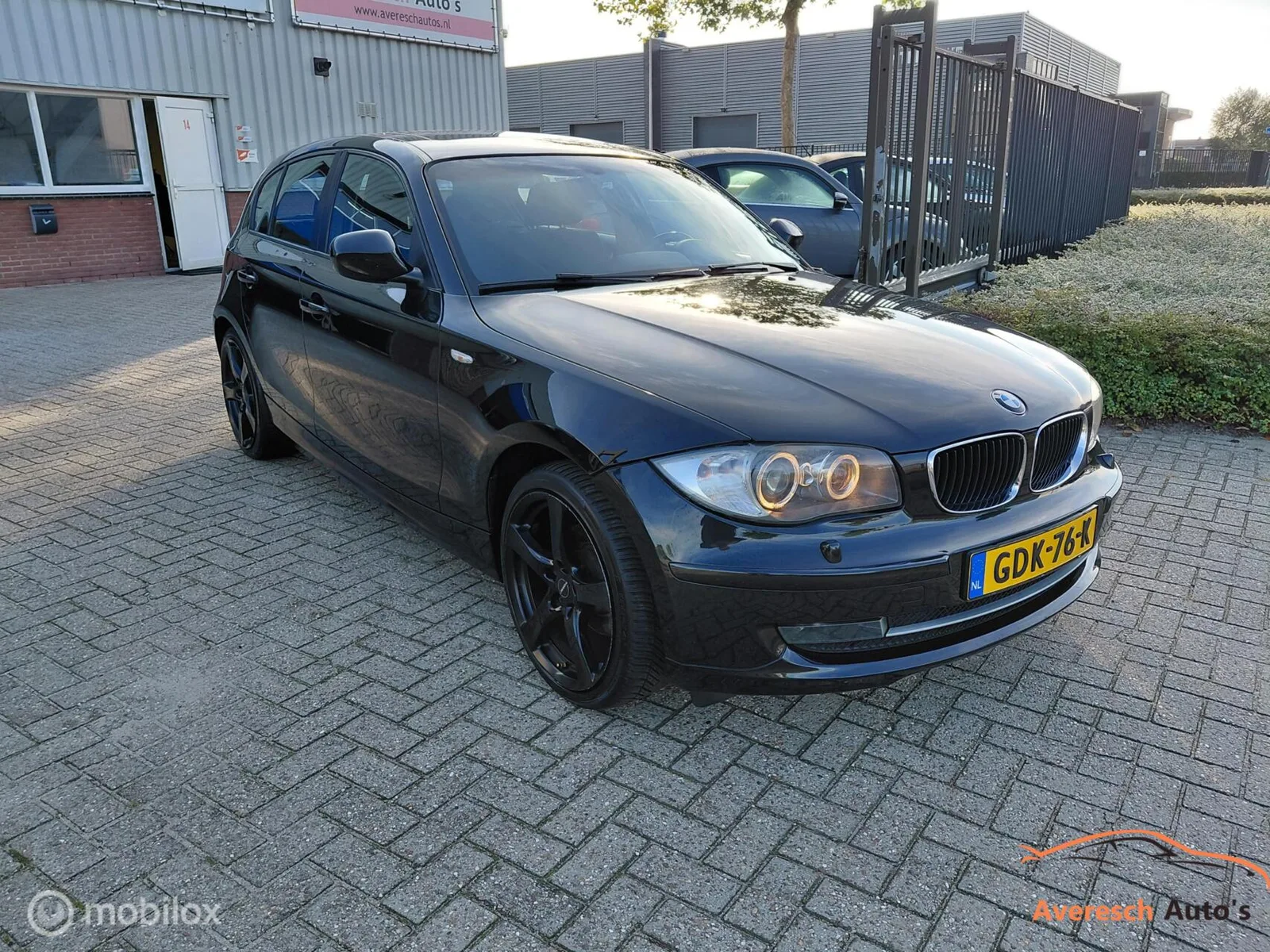 BMW 1-Serie (2009) — foto 1